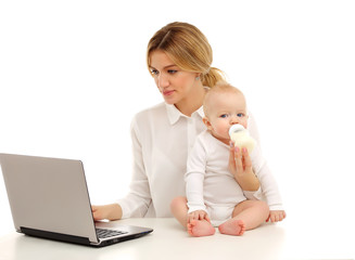 Portrait of a mother and a child working at a computer.