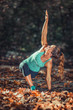 © Microgen - Woman Exercising Outdoors in The Fall