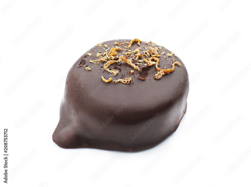 Tasty dark chocolate candy on white background