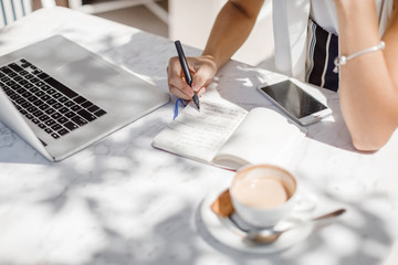 A Woman Freelancer Working at Cafe