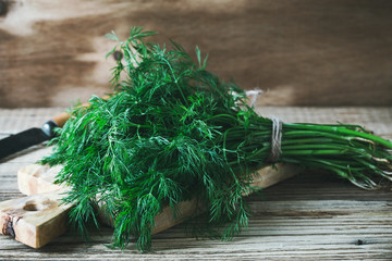 Wall Mural - Fresh homegrown dill on rural table