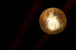 Old round light bulb with space on dark background, technology & energy concept