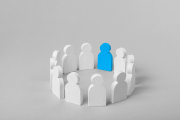 Wall Mural - Concept leader of  business team. Crowd of white men stands in  circle and listens to the leader of the blue