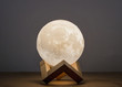 Moon bedside lamp in a wooden stand
