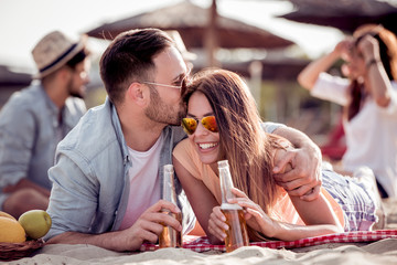 Sticker - Romantic young couple on the beach,enjoying together