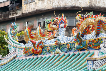 Lee Ti Miew temple Chinese shrines in Bangkok's Chinatown is the Li Thi Miew temple on Plabplachai Road, not far from Wat Kanikaphon. The temple features a large shed-like roof sheltering several shri