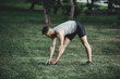 © Vadym - Runner doing stretching exercise before jogging