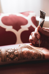 Wall Mural - Bridal henna being applied to hands