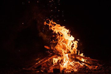 fire flames with sparks on a black background