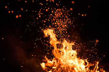 fire flames with sparks on a black background