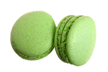 green macaroon isolated on white background without a shadow closeup. Top view. Flat lay