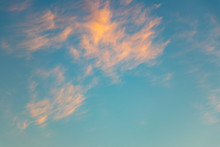 Background. Beautiful Evening Blue Sky With Orange Clouds. Defocus