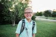 © kknox/Stocksy - 5th grade student on his first day of school