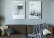 © MaaHoo/Stocksy - Sofa, wall art in modern living room