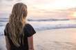 © Jovo Jovanovic/Stocksy - Woman looking at the ocean