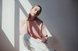 © Sergey Filimonov/Stocksy - Studio fashion portrait of gorgeous teen girl