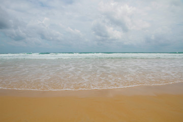 Beach wave sea summer day with sand in beach summer travel holiday