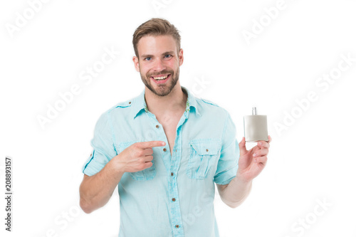 Fotografie, Obraz Happy man point finger at perfume bottle