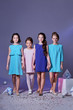 Four 4 elegant beautiful teen girls together.Group children,designer dress for event, holiday, prom.Teenager posing,catalog clothes.Classic lady style for kids,teens. Attractive young fashion models.
