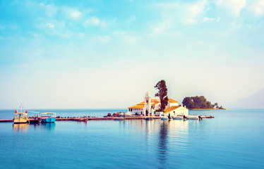 Wall Mural - nice optimistic bright view of vlacherna monastery on the kanoni peninsula in kerkyra, corfu, greece