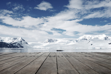 Sticker - empty brick ground with sonw mountain as background