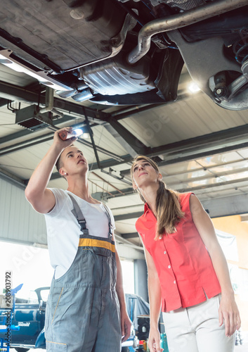Reliable Auto Mechanics >> Low Angle View Of A Reliable Auto Mechanic Holding A Reliable Auto Mechanics >> Low Angle View Of A Reliable Auto Mechanic Holding A