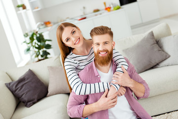 Poster - Leisure lifestyle tenderness toothy beaming smile vacation holiday 8-march day gentle back concept. Portrait of excited cheerful lovely romantic playful partners spending time in new light modern flat