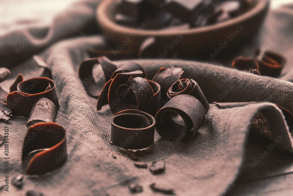 Chocolate curls on fabric, closeup
