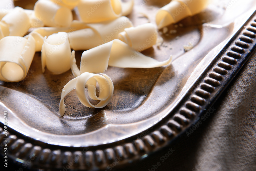 Chocolate curls on tray, closeup