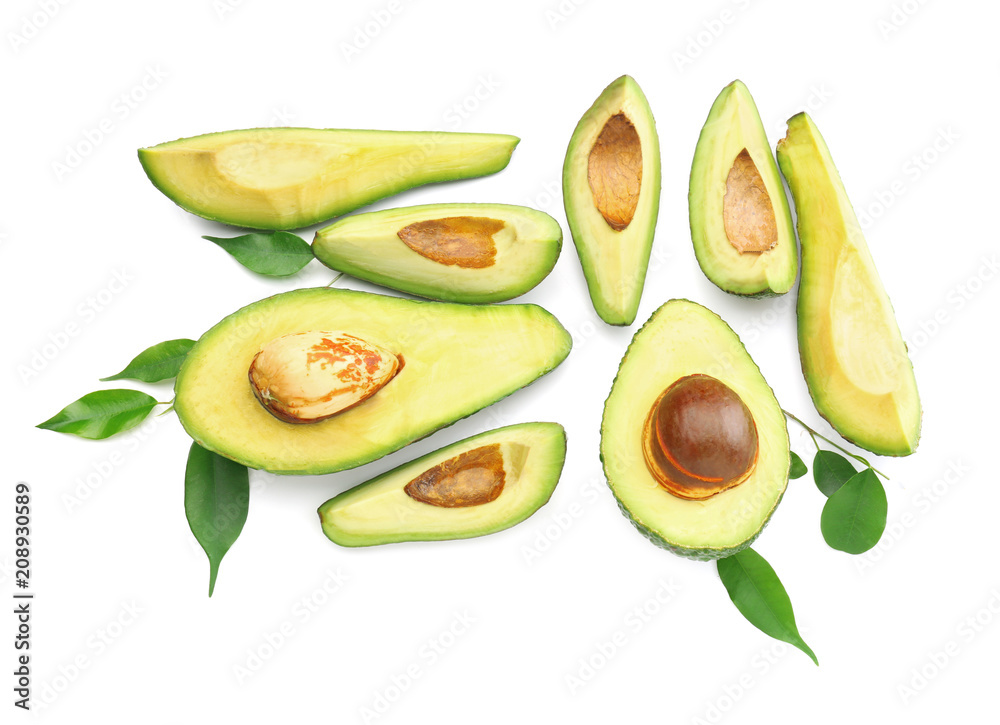 Pieces of ripe avocados on white background