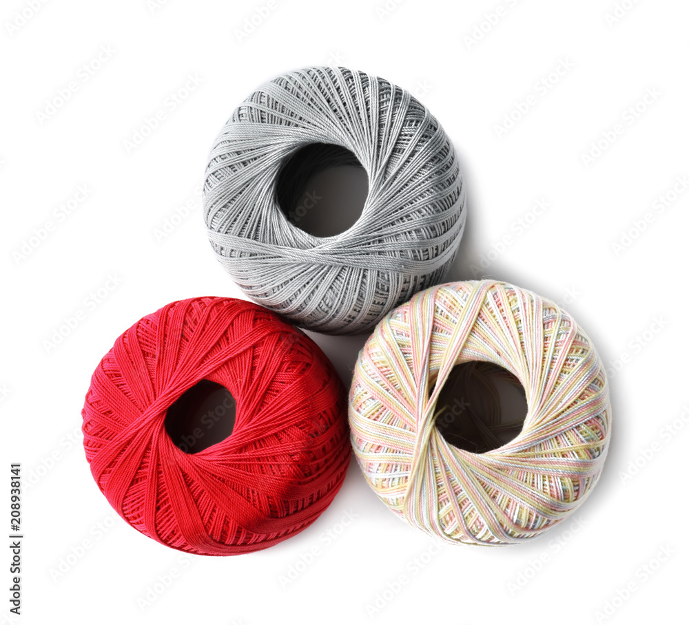 Knitting threads on white background