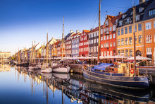 COPENHAGEN, DENMARK - MAY 6, 2018: Picturesque View Of Historical Buildings And Moored Boats Reflected In Calm Water, Copenhagen, Denmark