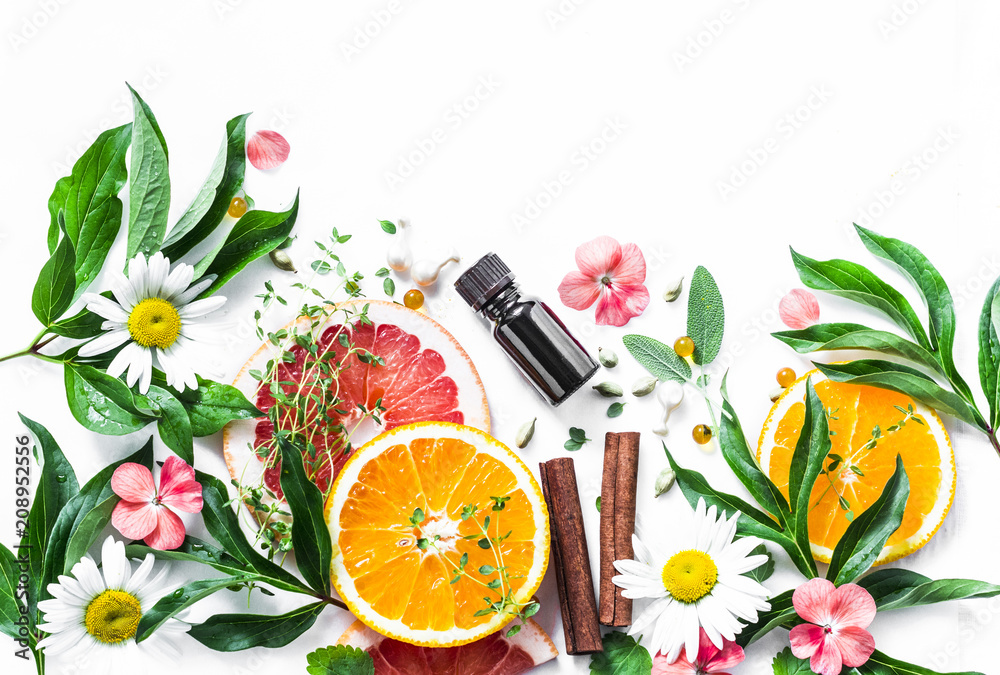 Essential oil for beauty skin. Flat lay beauty ingredients on a light background, top view. Beauty healthy lifestyle concept. Copy space - obrazy, fototapety, plakaty 