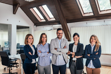 Wall Mural - Potrait of a young confident business team.