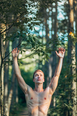 Fit Young Man in the Forest