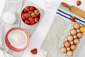 Poster - Frame set ingredients cooking strawberry pie cake white background Flat lay top view Eggs flour milk sugar strawberry top view Bakery background Recipe strawberry pie Rustic style