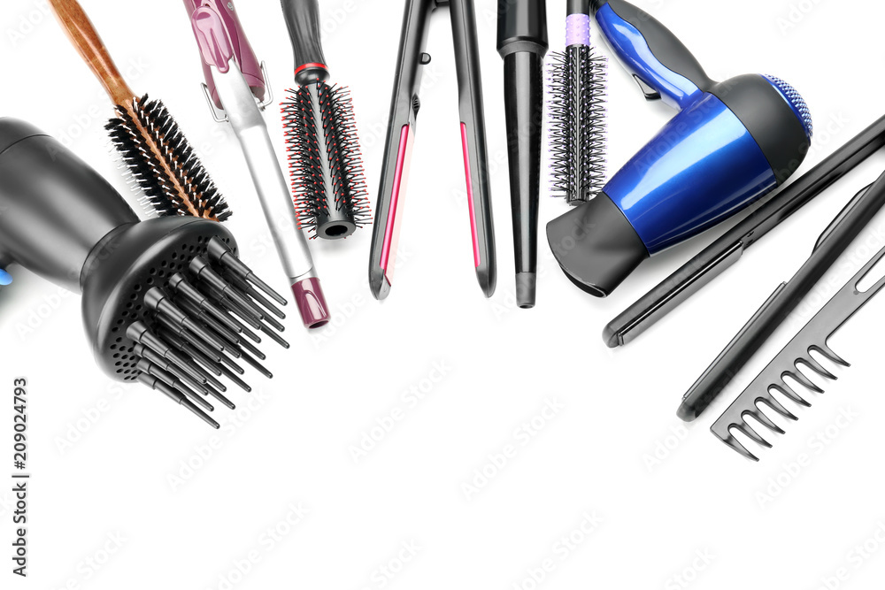 Professional hairdresser's tools on white background