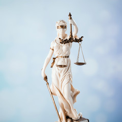 Goddess of justice on a light background