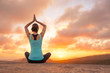 © kieferpix - Young woman practicing yoga on a mountain top at sunset. Meditation.