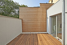 Wall Construction With Insulating Wood Cladding