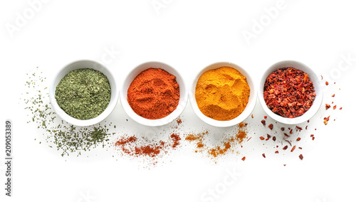 Cuadros en Lienzo Bowls with various spices on white background