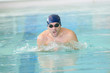 © auremar - man swimmer swimming crawl in swimming pooltraining for triathlon
