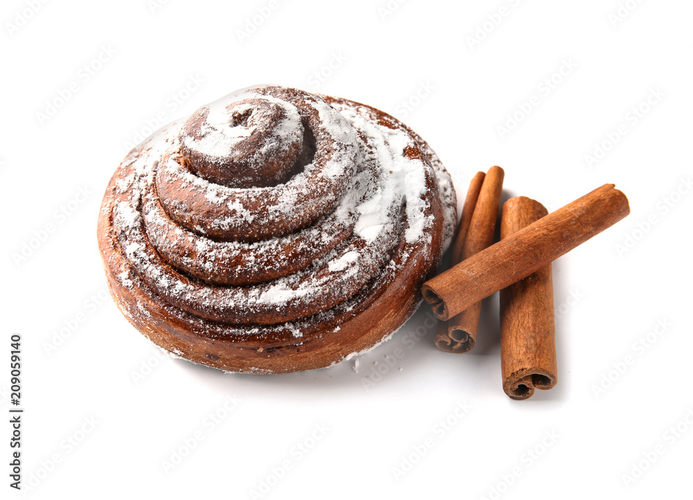 Sweet cinnamon bun on white background