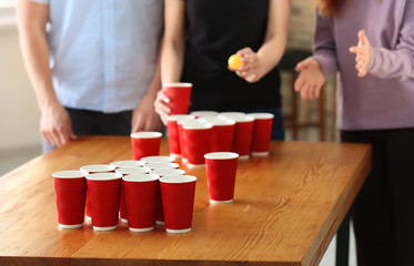 Wall Mural - People playing beer pong in bar