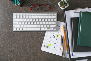 Wall Mural - Calendar with to-do list, computer keyboard and notebooks on grey background