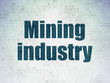 © Maksim Kabakou - Industry concept: Painted blue word Mining Industry on Digital Data Paper background