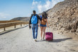 Adventurous couple, with backpack, going around the world.