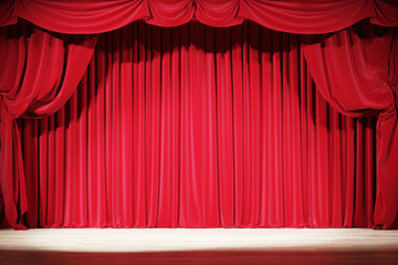 The interior of the old theater with red velvet curtains