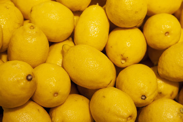 Colorful Display Of Lemons In Market