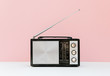 © kkgas/Stocksy - Vintage radio on pink background